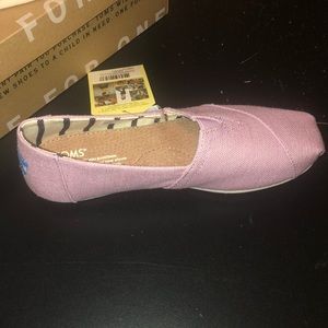 Brand new Toms
